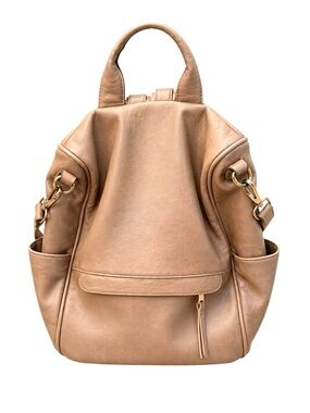 Madison West Convertible Shoulder Backpack in Blush Pink in excellent condition.